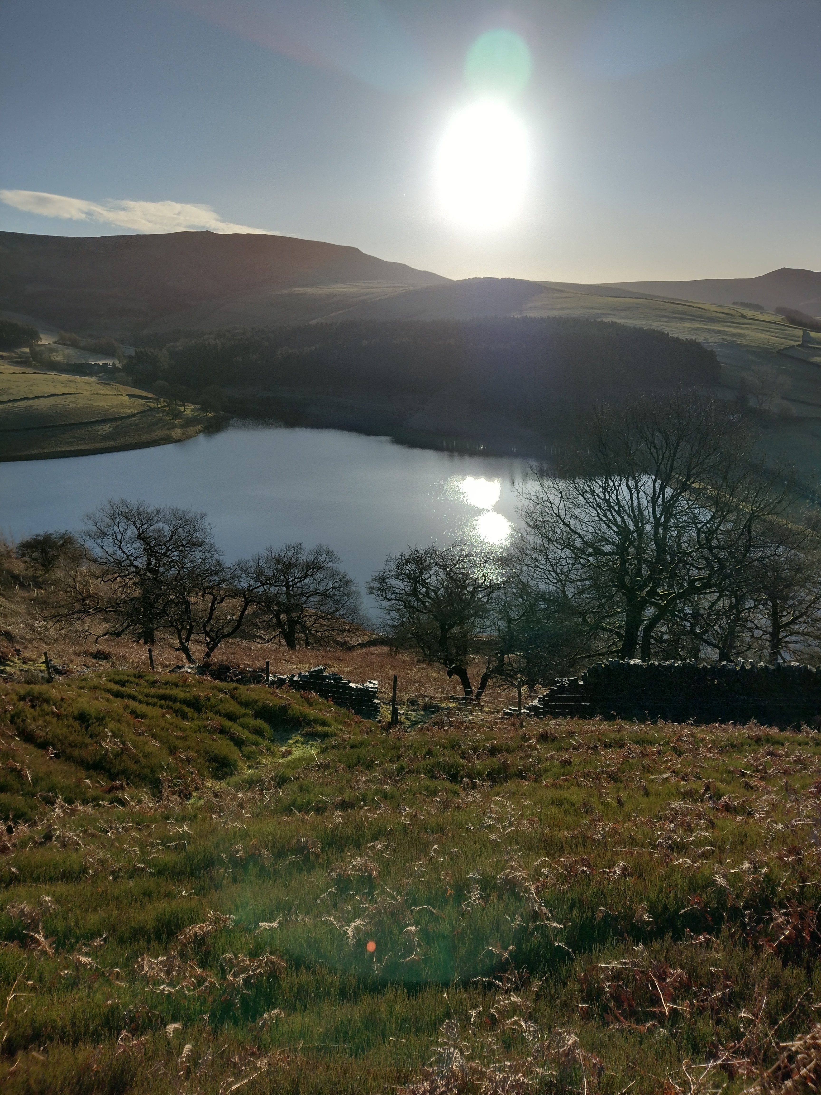 Kinder Reservoir with sunlight reflecting on the water